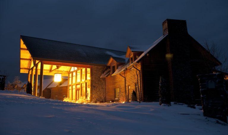 Snow Covered Countryside Hotel at Night
